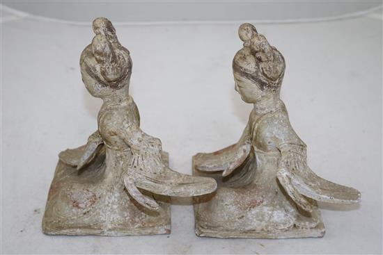 Two Chinese pottery seated figures of ladies, probably Tang dynasty, height 18cm, repairs